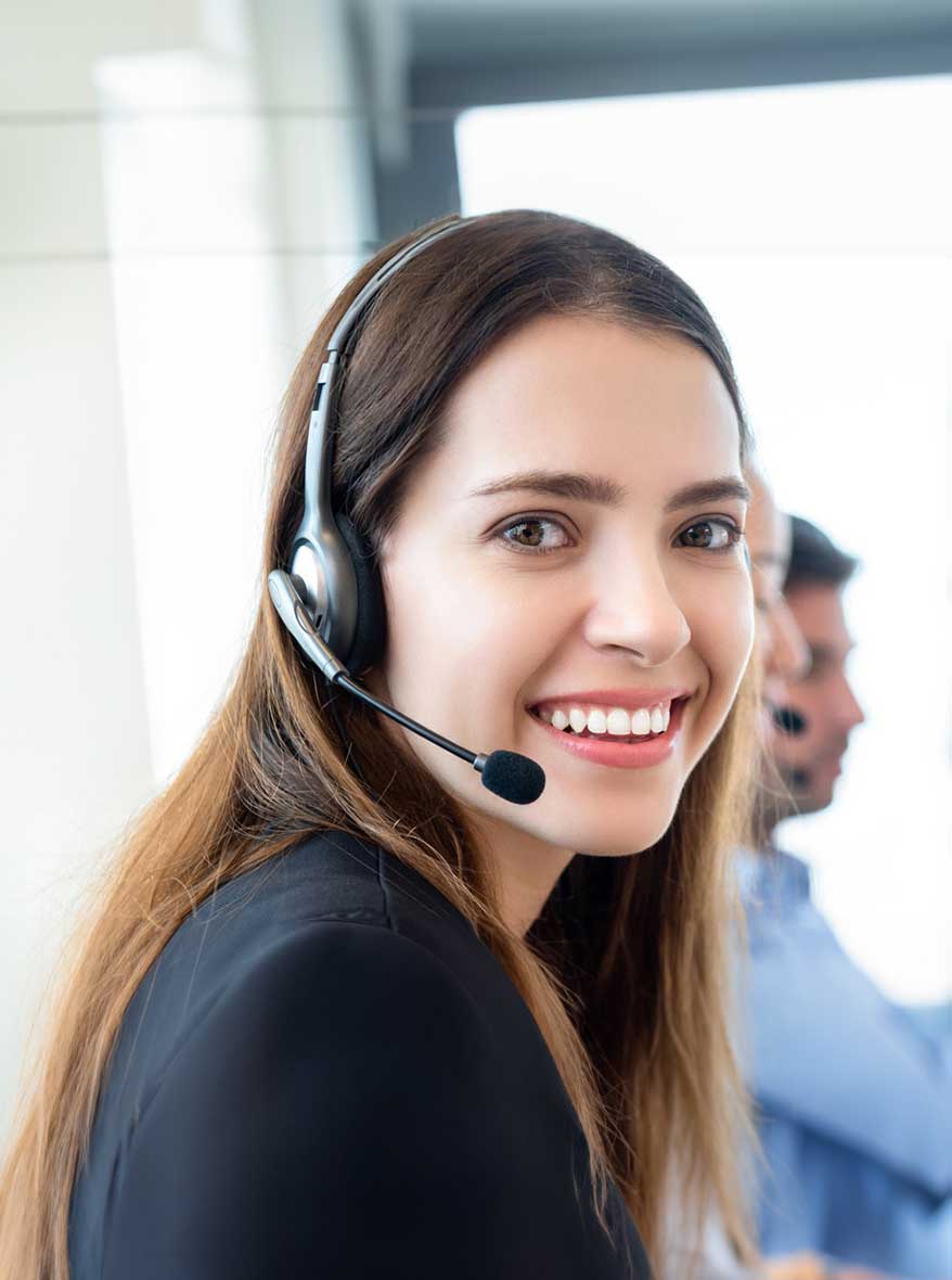 Smiling woman wearing a headset