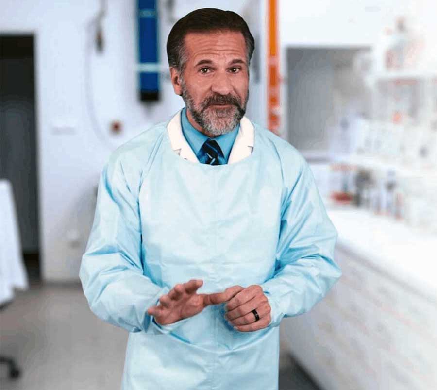 Man wearing a Duragown in a labaratory